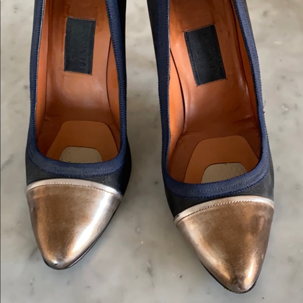Lanvin metallic cap toe heels.